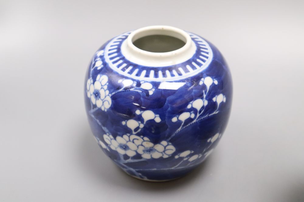 A blue and white Chinese dragon jar, an Imari jar and a blue and white lidded Prunus jar, tallest 17.5cm